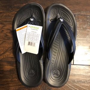 NWT Men’s Crocs Flip Flops.